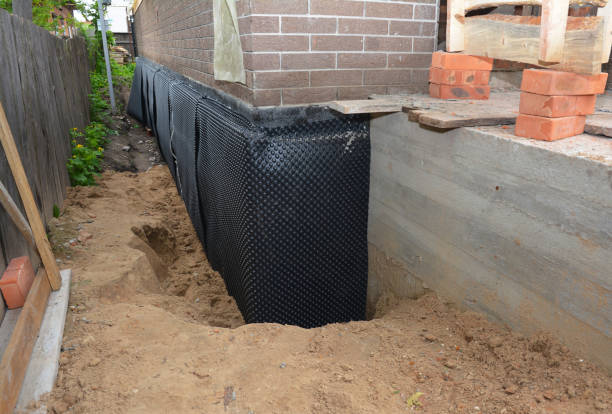 Happy homeowners after waterproofing job in Valhermoso Springs